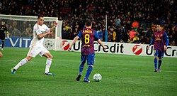 Iniesta on the ball for Barcelona against Bayer Leverkusen in 2012