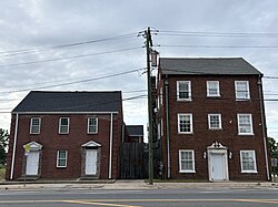 604 W Chapel Hill Street (left) was the home of Feminiary, a lesbian feminist newspaper