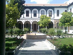 Maktab Anbar built in the traditional Damascene style with a central fountain