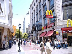 San Martín St. (facing south), at the intersection with Córdoba St. (32°56′48″S 60°38′12″W﻿ / ﻿32.9467°S 60.6367°W)