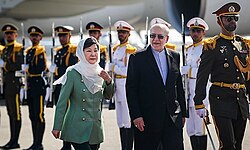 Park Geun-hye being welcomed by Iran's business minister, Mohammad Reza Nematzadeh in Mehrabad Airport