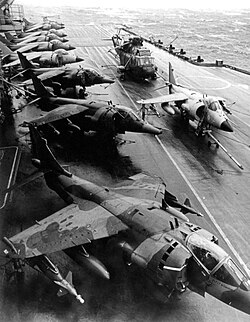 Royal Air Force Harrier Gr.3s and Royal Navy Sea Harrier FRS.1s on the flight deck of HMS Hermes on 19 May 1982
