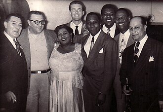 From left: Jack Teagarden, Sandy DeSantis, Velma Middleton, Fraser MacPherson, Cozy Cole, Arvell Shaw, Earl Hines, Barney Bigard at the Palomar Supper Club, Vancouver, B.C., March 17, 1951