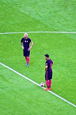 Suárez (front) with Lionel Messi prior to kick off in a pre-season friendly match in 2016