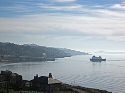 Wemyss Bay, view looking south from Cliff Terrace Road, with MV Bute approaching Wemyss Bay railway station and pier.