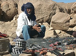 Tuareg selling crafts to tourists in the Hoggar (Algeria)