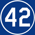 Jackie Robinson's number 42 was retired by the Los Angeles Dodgers in 1972, and by all MLB teams in 1997.