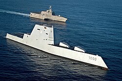 USS Zumwalt, the lead ship of the US Navy's Zumwalt class, sailing in formation with USS Independence (rear)