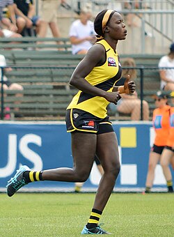 A uniform consists of a guernsey, shorts, socks and boots.
