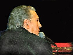 Lewis performing in 2006