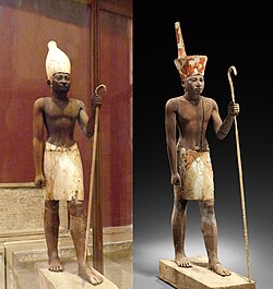 Pair of guardian statuettes, depicting Middle Kingdom pharaohs, presumably Senusret I or Amenemhat II, with the white crown of Upper Egypt (left), the other with the red crown of Lower Egypt.[76] The 12th dynasty had origins in Ta-Seti, Upper Egypt/Lower Nubia.[77][78]