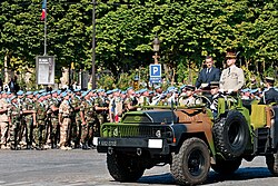 Nicolas Sarkozy, President of France and General Jean-Louis Georgelin, Chief of the Defence Staff, reviewing troops during the 2008 Bastille Day military parade on the Champs-Élysées in Paris