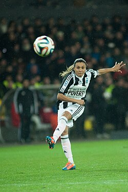 Marta playing in the Match Against Poverty in March 2014