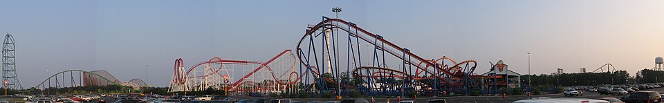 Skyline of Six Flags Great Adventure in Jackson Township, New Jersey, the world's largest theme park[285] To the far left is Kingda Ka, the world's tallest roller coaster until its closure in 2024.[286]