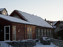 Schools in the villages around the islands were not common until late 19th century. This is the first school in Sørvágur, built from 1885 to 1887 (the stone building). Now it houses the Music School of Vágar island.