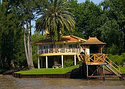 Boat dock-shed and typical house on stilts in Tigre, Buenos Aires (Lower Delta)