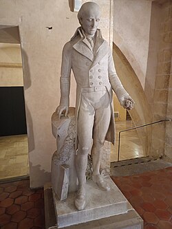 Marble statue of Adanson displayed at the former Episcopal Palace in Aix-en-Provence, depicted holding a shell