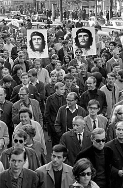 Portraits of Che Guevara at a march during the West German student movement