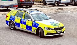 Bilingual Police Scotland vehicle logo