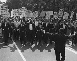 Jewish civil rights activist Joseph L. Rauh Jr. marching with Martin Luther King Jr. in 1963