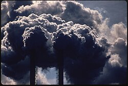 Stacks emitting smoke from burning discarded automobile batteries, photo taken in Houston in 1972 by Marc St. Gil, official photographer of recently founded EPA