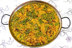 Some historians suggest Valenciana paella influenced jambalaya.