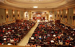 Many Christians attend church services to celebrate the birth of Jesus Christ[115]