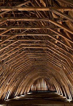 Heart of oak beams of the frame of the Église Saint-Girons in Monein, France