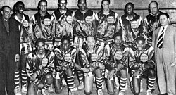 The 1950 World Series Harlem Globetrotters, with owner Abe Saperstein (right) and team secretary W. S. Welch (left)