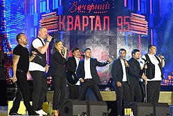 Zelenskyy (centre) performing with Kvartal 95 in 2018