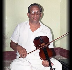 Akella Mallikarjuna Sarma playing the Violin in the Indian Carnatic music style