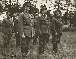 General John J. Pershing, Major General Beaumont B. Buck and Brigadier General Fred W. Sladen inspecting the Guard of Honor of the 3rd Battalion, 7th Infantry Regiment, 3rd Division, Vaucouleurs, France, 1918