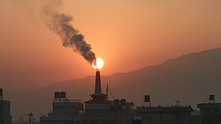 Industrial processes contributing to air pollution through the emission of carbon dioxide, sulfur dioxide, and nitrous oxide.