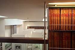 The Guardian's Newsroom visitor centre and archive (No 60), with an old sign with the name The Manchester Guardian