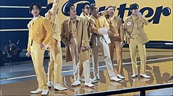 BTS performing "Butter" at the 49th American Music Awards on November 21, 2021[240]
