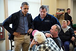President Barack Obama and Governor Chris Christie talk with local residents in Brigantine, New Jersey.