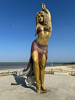 A 21-foot bronze statue of Shakira erected in 2023 in Barranquilla, Colombia