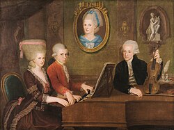 Portrait of the Mozart Family, c. 1780 (attrib. Johann Nepomuk della Croce); the portrait on the wall is of Mozart's mother.