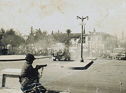 A British soldier facing a crowd of Greek Cypriot demonstrators in Nicosia (1956)