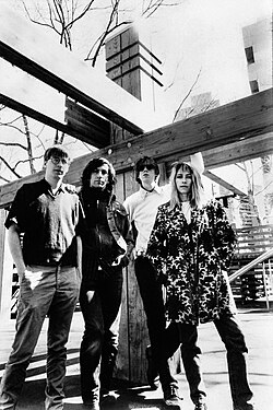 Sonic Youth in a publicity photo issued by SST to promote their fourth album, Sister (1987). Left to right: Shelley, Ranaldo, Moore, Gordon