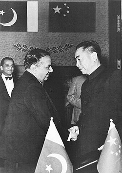 Pakistani Prime Minister Huseyn Shaheed Suhrawardy with Chinese Premier Zhou Enlai signing the Treaty of Friendship Between China and Pakistan.[308] Pakistan is host to China's largest embassy.[309]