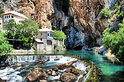 Buna river, near the town of Blagaj in southern Herzegovina. Blagaj is situated at the spring of the Buna river and a historical tekke (tekija or Dervish monastery). The Blagaj Tekija was built around 1520, with elements of Ottoman architecture and Mediterranean style[205][206] and is considered a national monument.