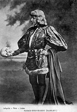 Sarah Bernhardt as Hamlet, with Yorick's skull (photographer: James Lafayette, c. 1885–1900)