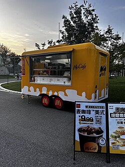 A McCafé-branded mobile coffee truck in China, 2024. McDonald’s has expanded the McCafé concept through modular and mobile retail formats in parts of Asia.