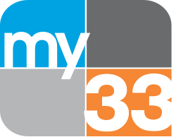 A four-quadrant rounded rectangle, from top left: blue, dark gray, light gray, light orange. In the blue box, the lowercase word "my" in white in a sans serif. In the lower lower right box, a white 33 in a sans serif.
