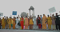 A formation of human chain at India Gate by the women from different walks of life at the launch of a National Campaign on prevention of violence against women, in New Delhi on 2 October 2009