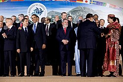 Sarkozy (at left) attending the G-8 Summit in 2009