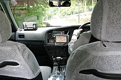 The inside of a Japanese taxicab in Kyoto with GPS navigation on board