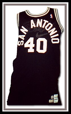 The Spurs sported radially arched black-and-white letters on their uniforms during much of the 1980s.[177]