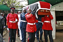 Pallbearers at a dignitary's burial in Kenya